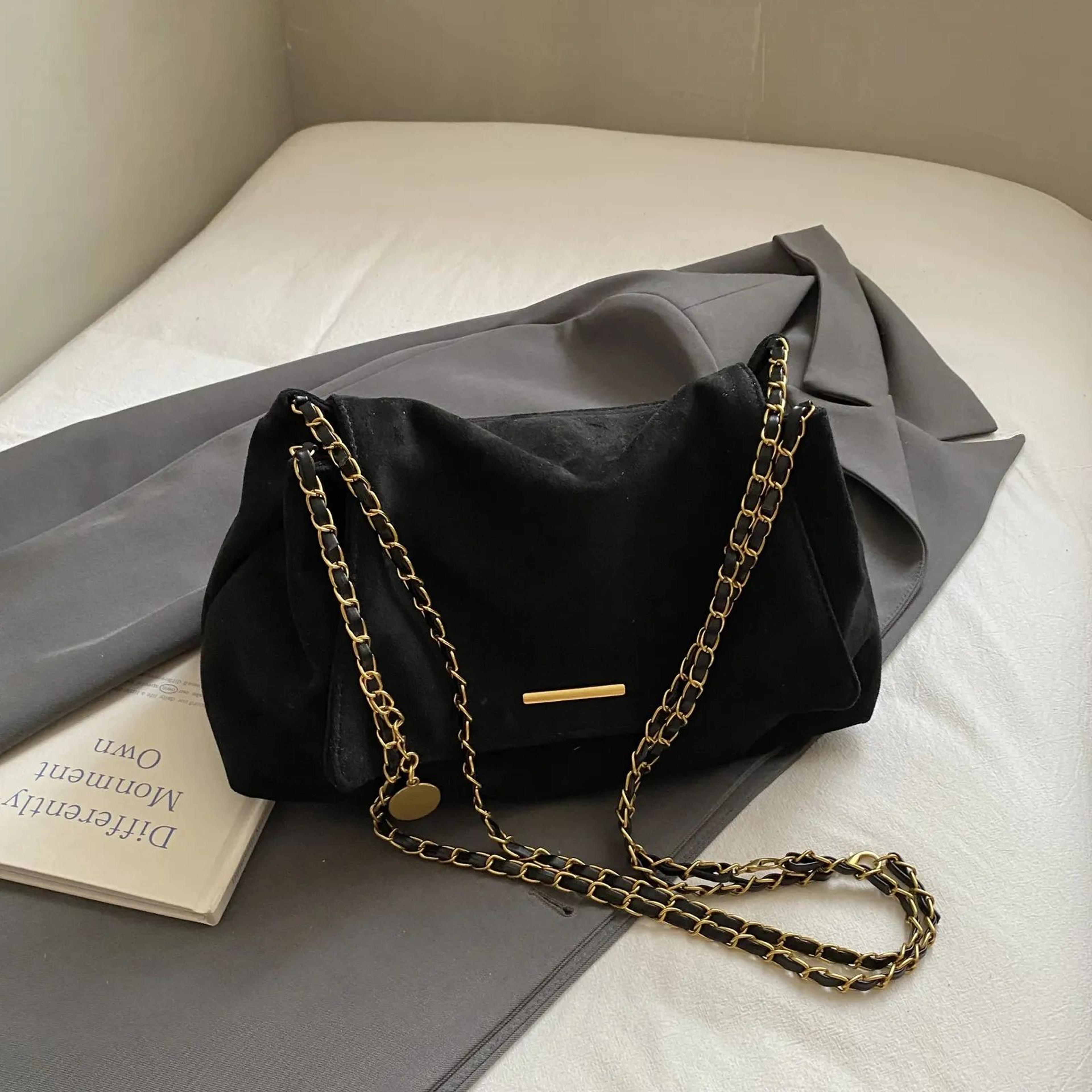 womens suede tote bag with adjustable chain strap and top handle