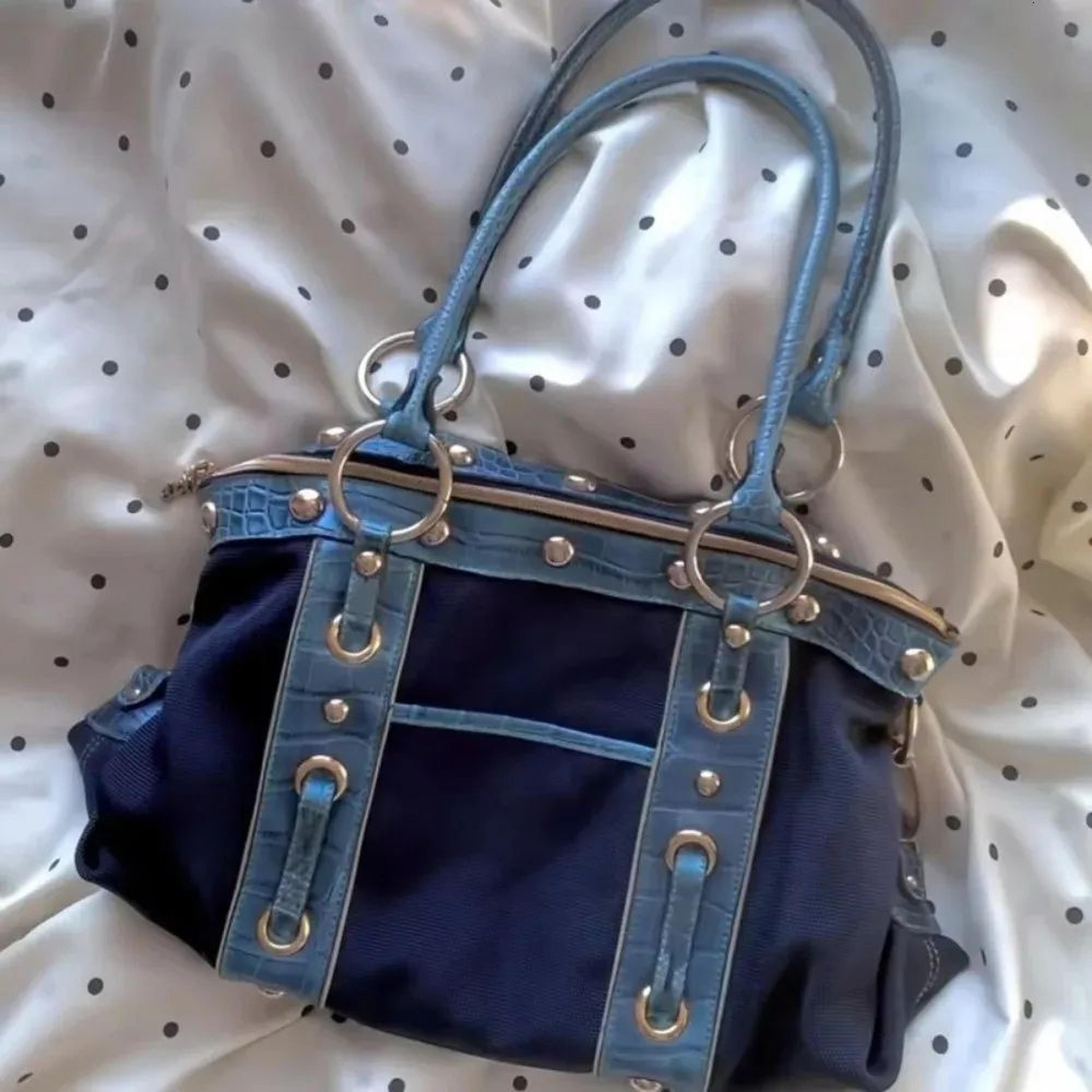 vintage patchwork shoulder bag for women with riveted design