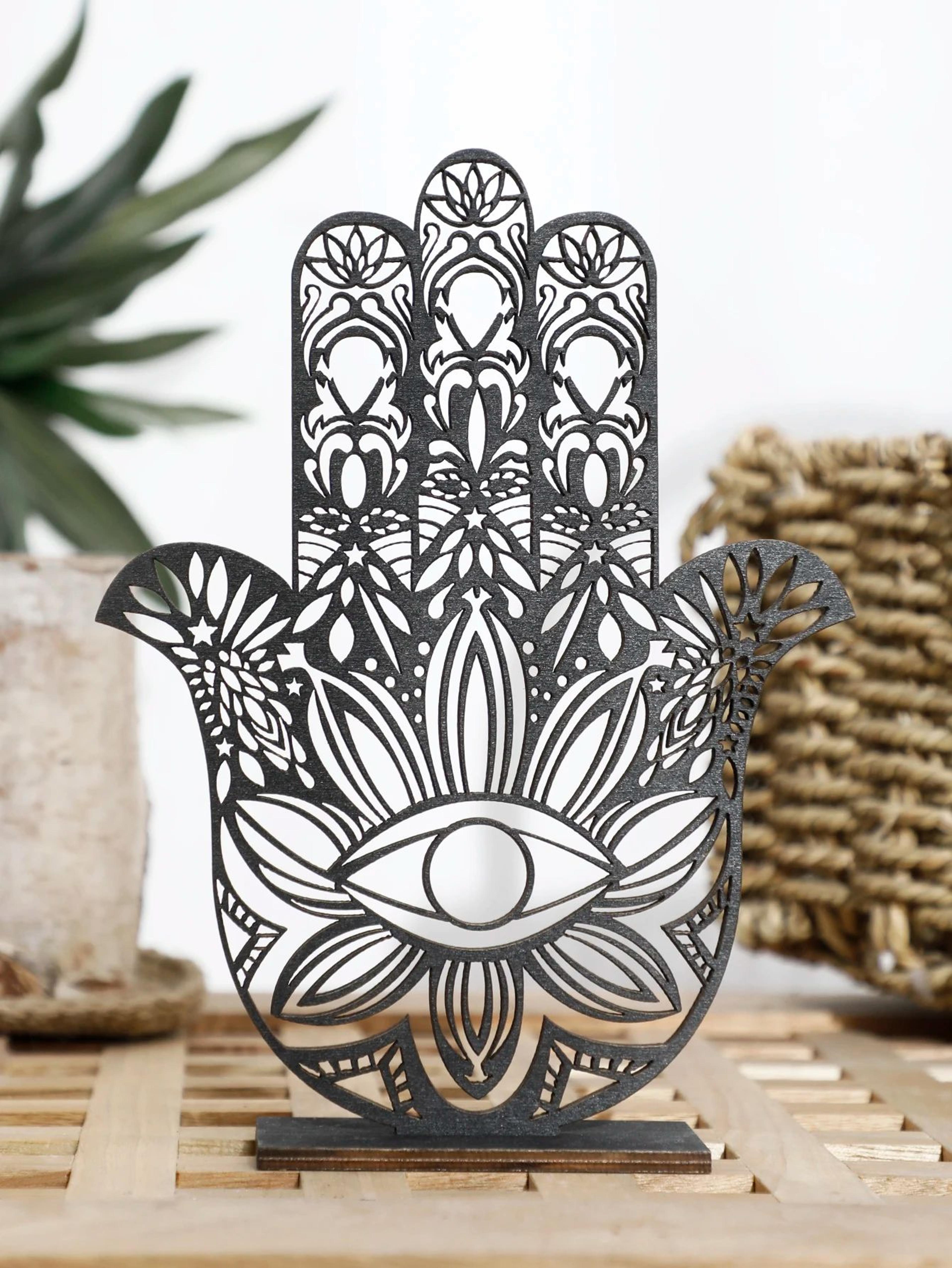 black wooden hamsa hand evil eye decor