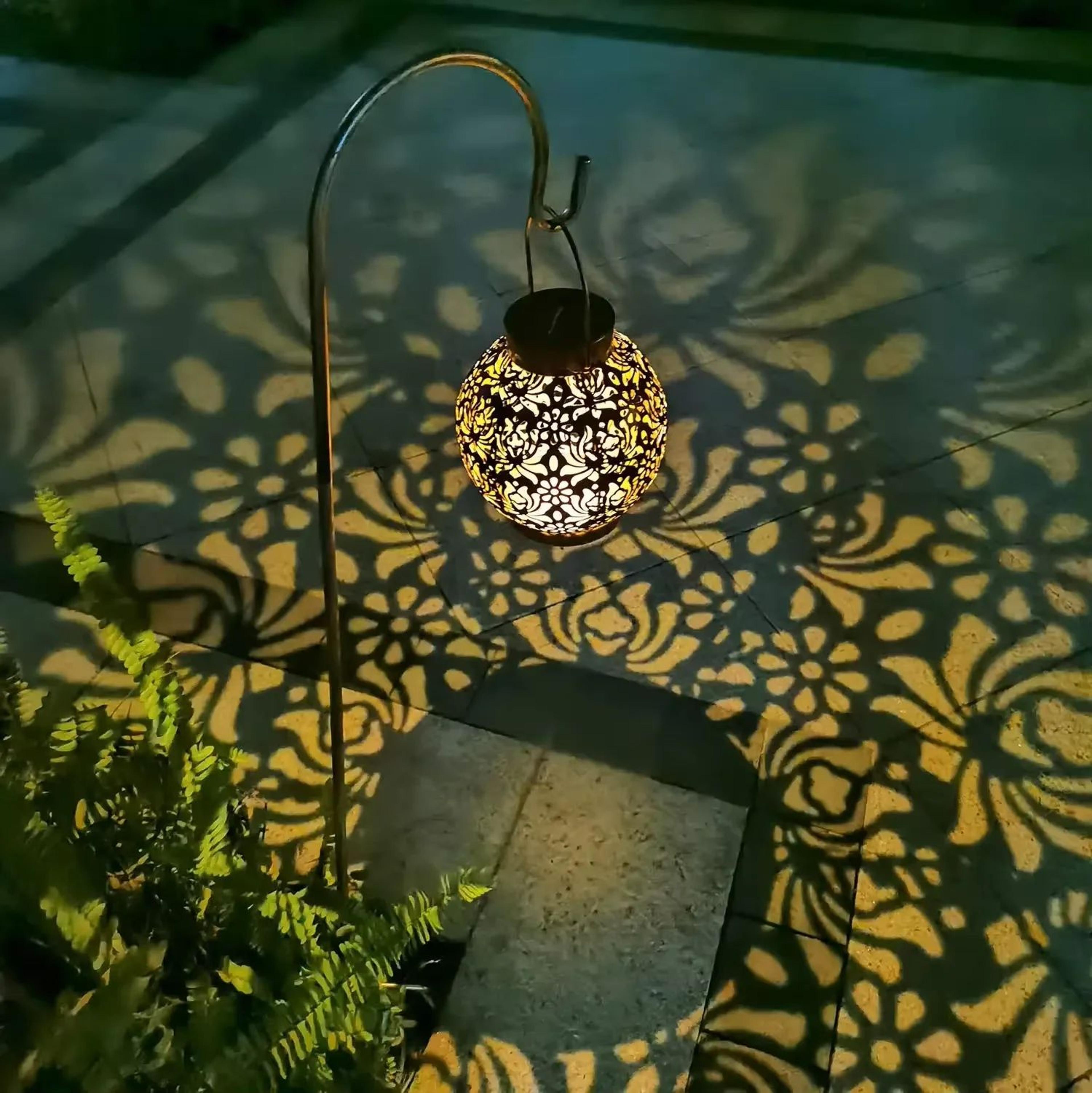 homefish solar iron hanging lantern with decorative light patterns