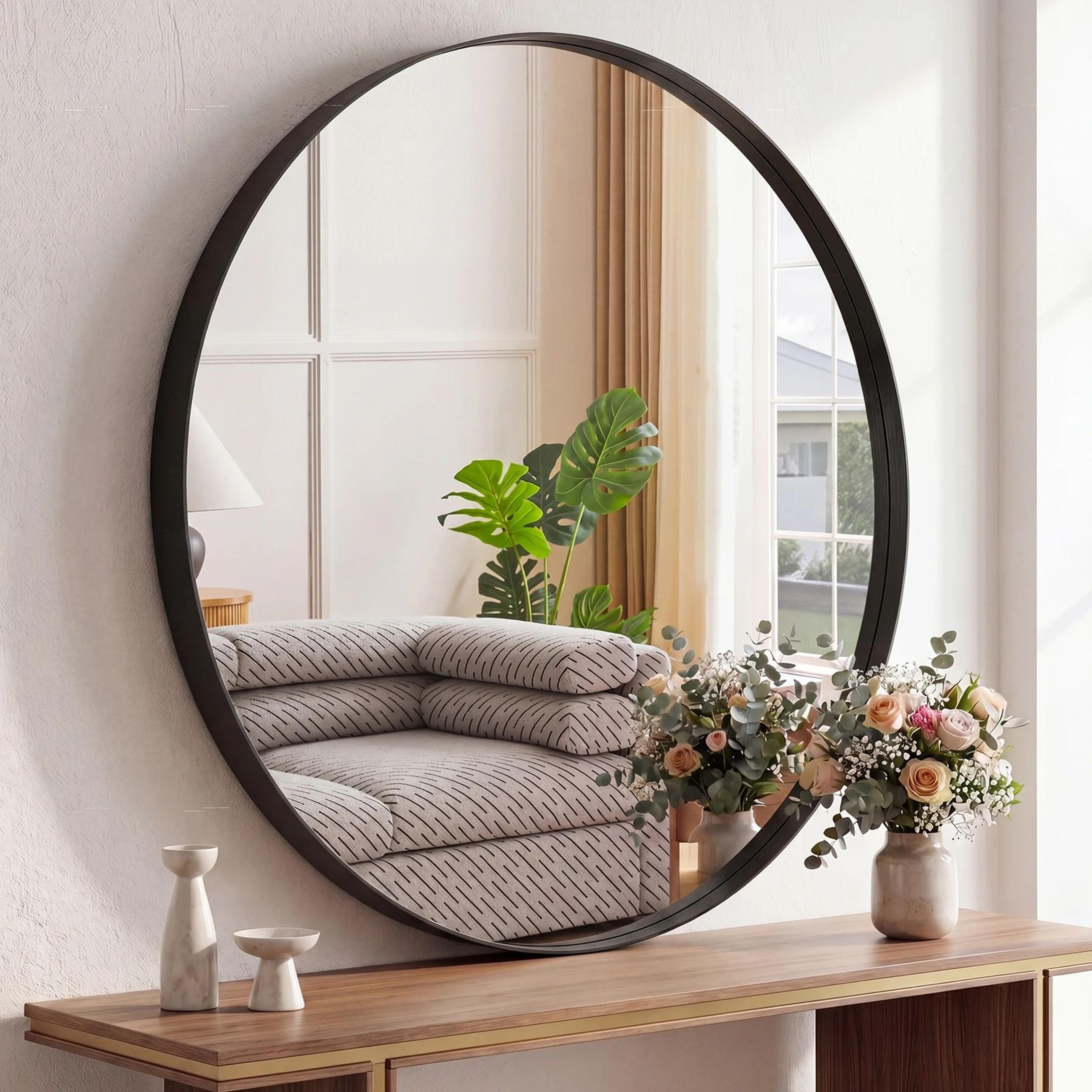gold round vanity mirror with matte metal frame for bathroom and home decor