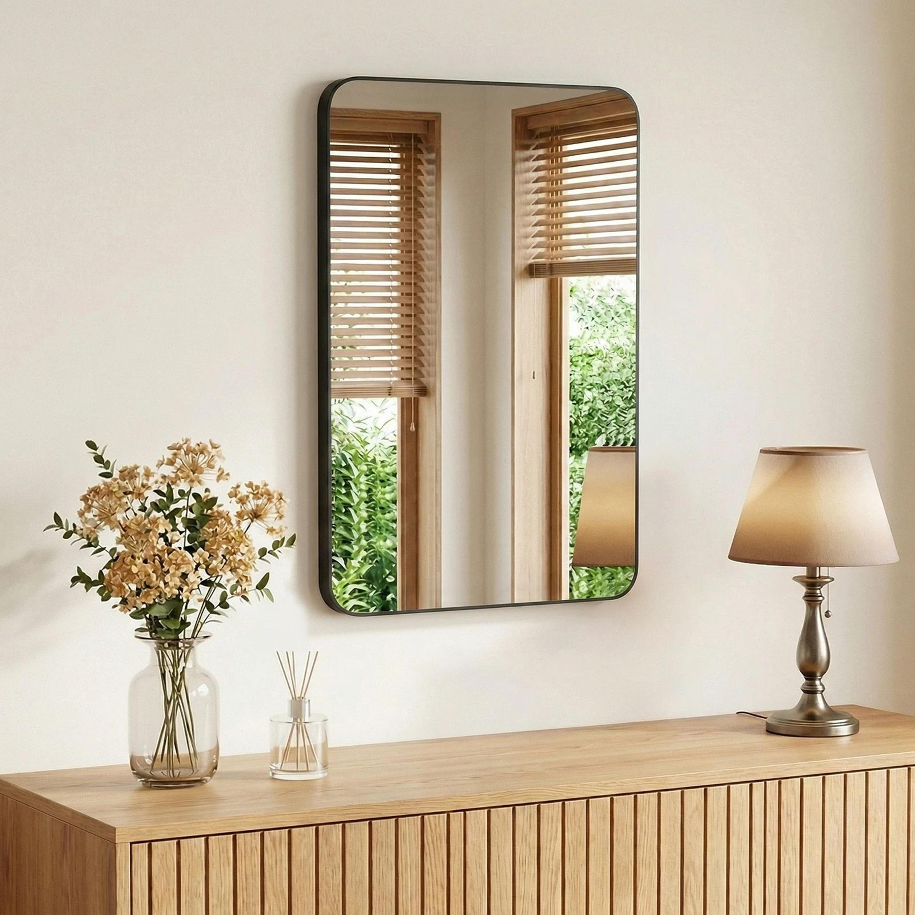 modern rounded rectangle wall mirror with metal frame and tempered glass