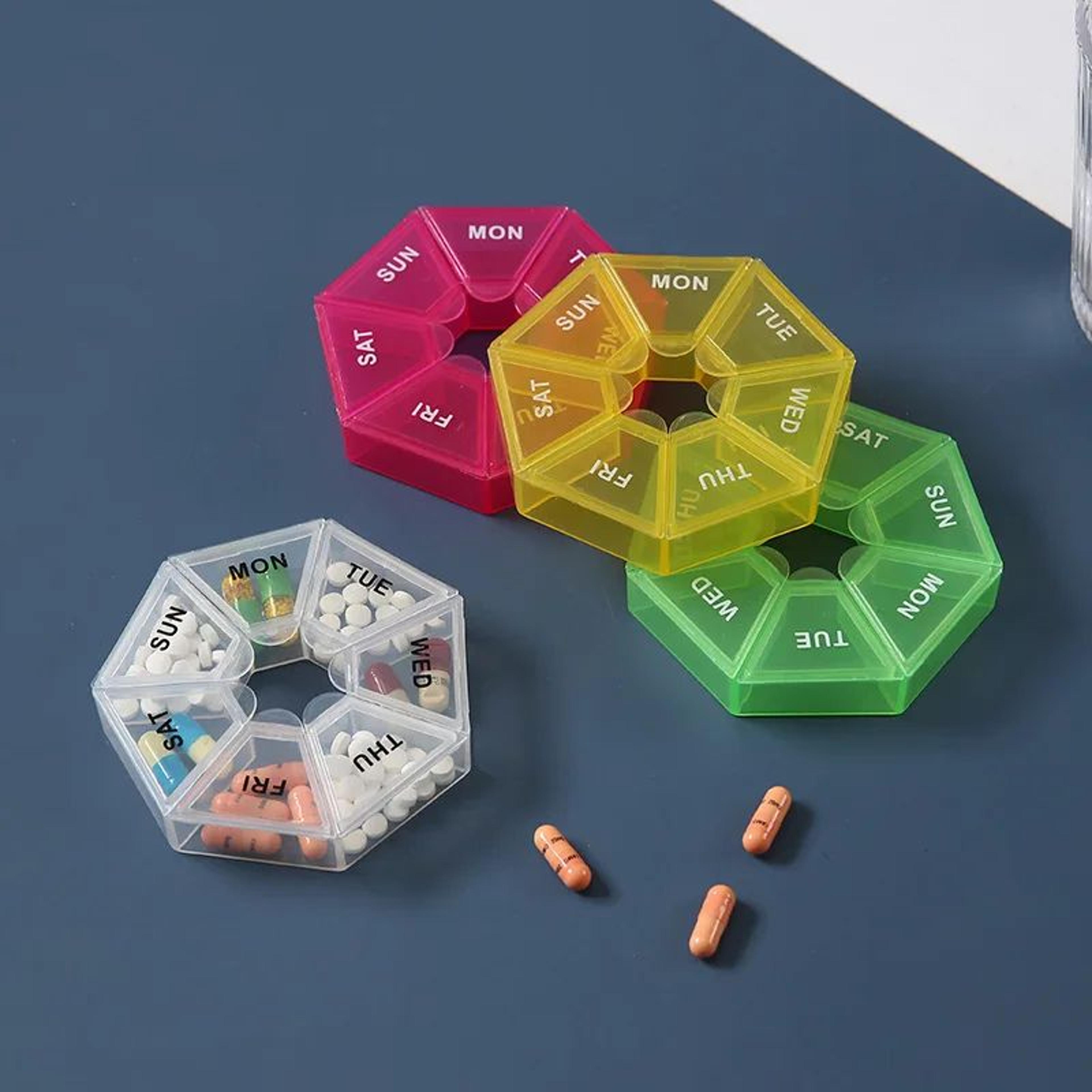 7-day portable pill organizer with 7 compartments for medicine and vitamins
