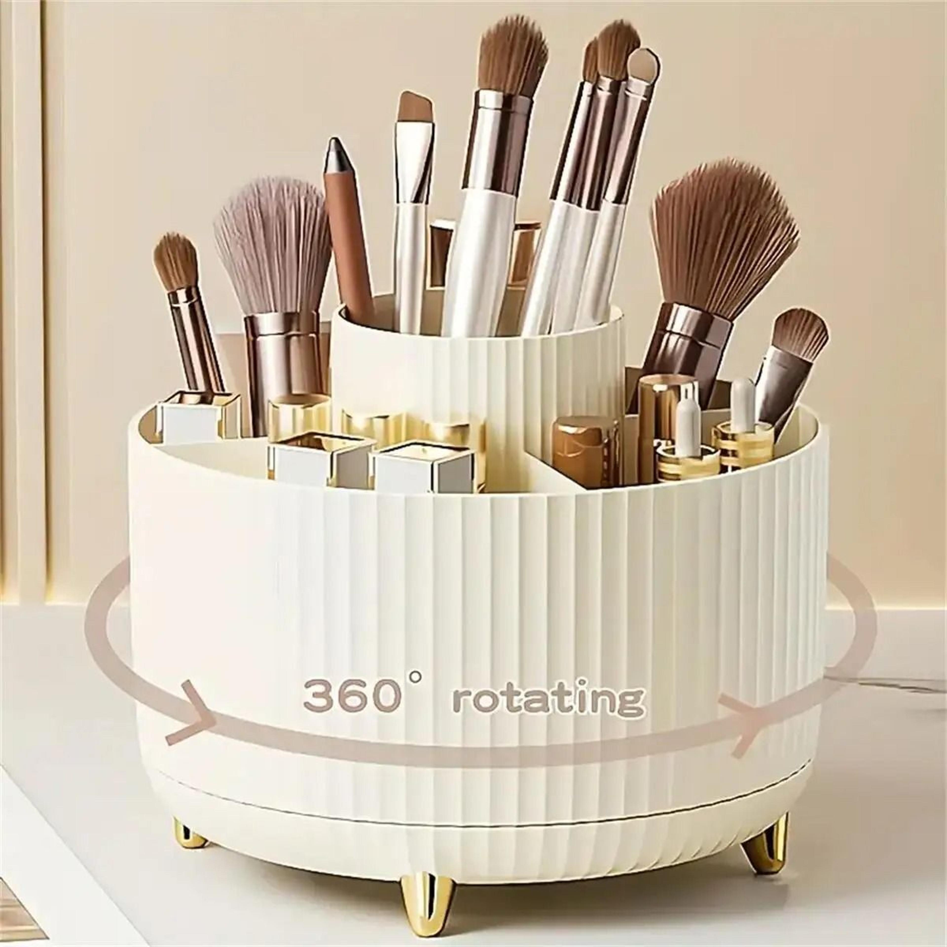rotating makeup organizer with brush holder and cosmetic storage compartments