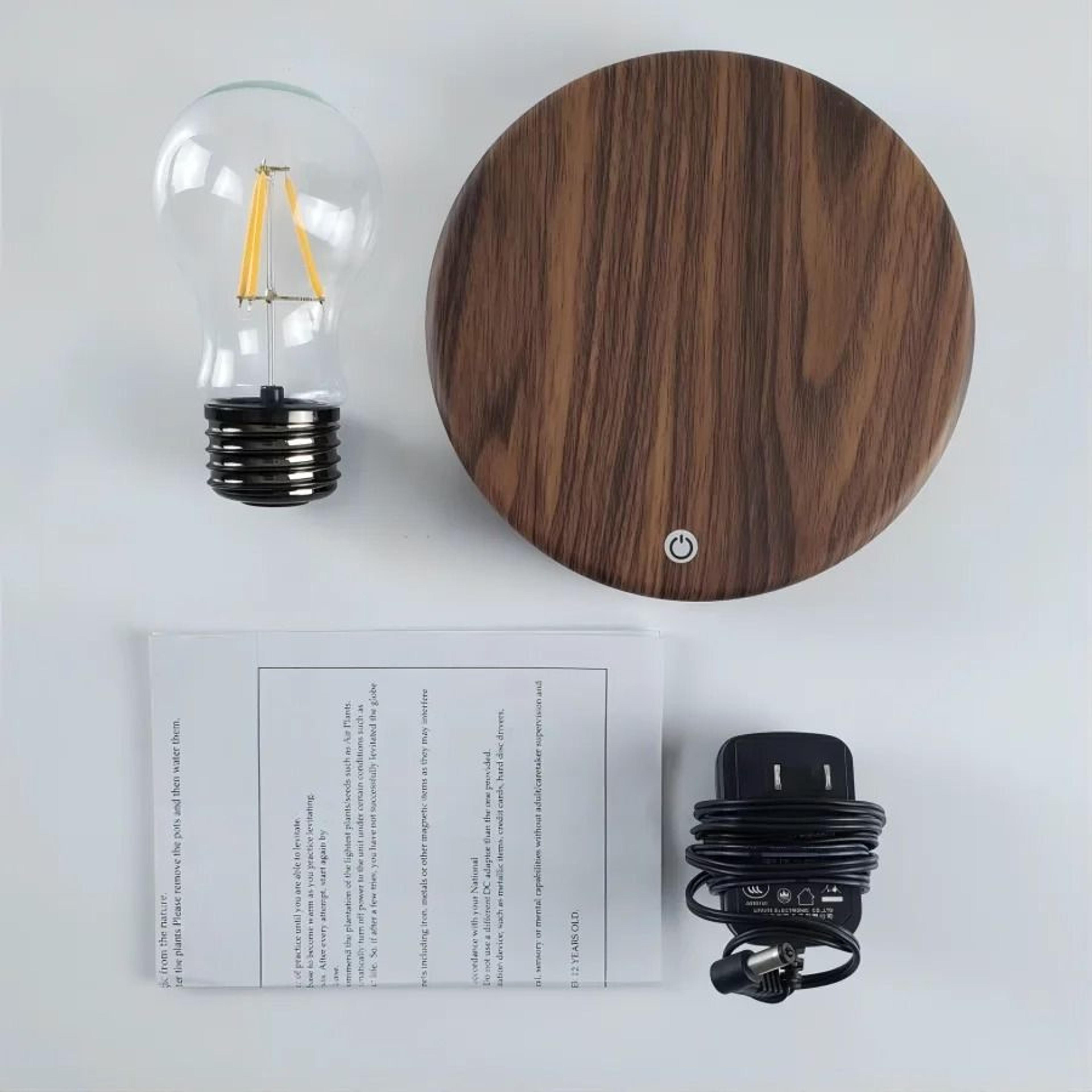 Magnetic Levitation Glass Bulb Lamp Creates Floating Light For Modern Desks 4