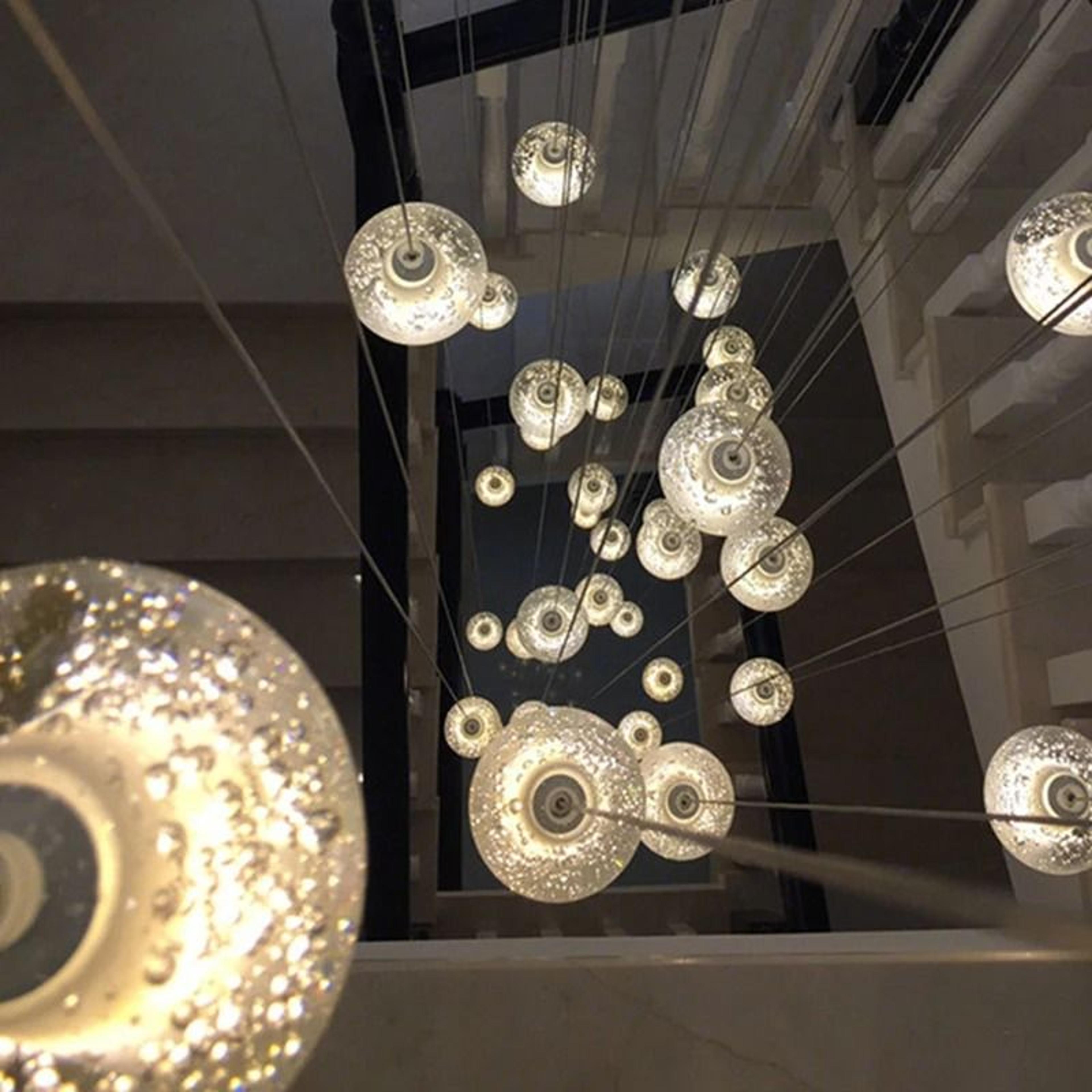 modern staircase chandelier for elegant living room and dining room lighting
