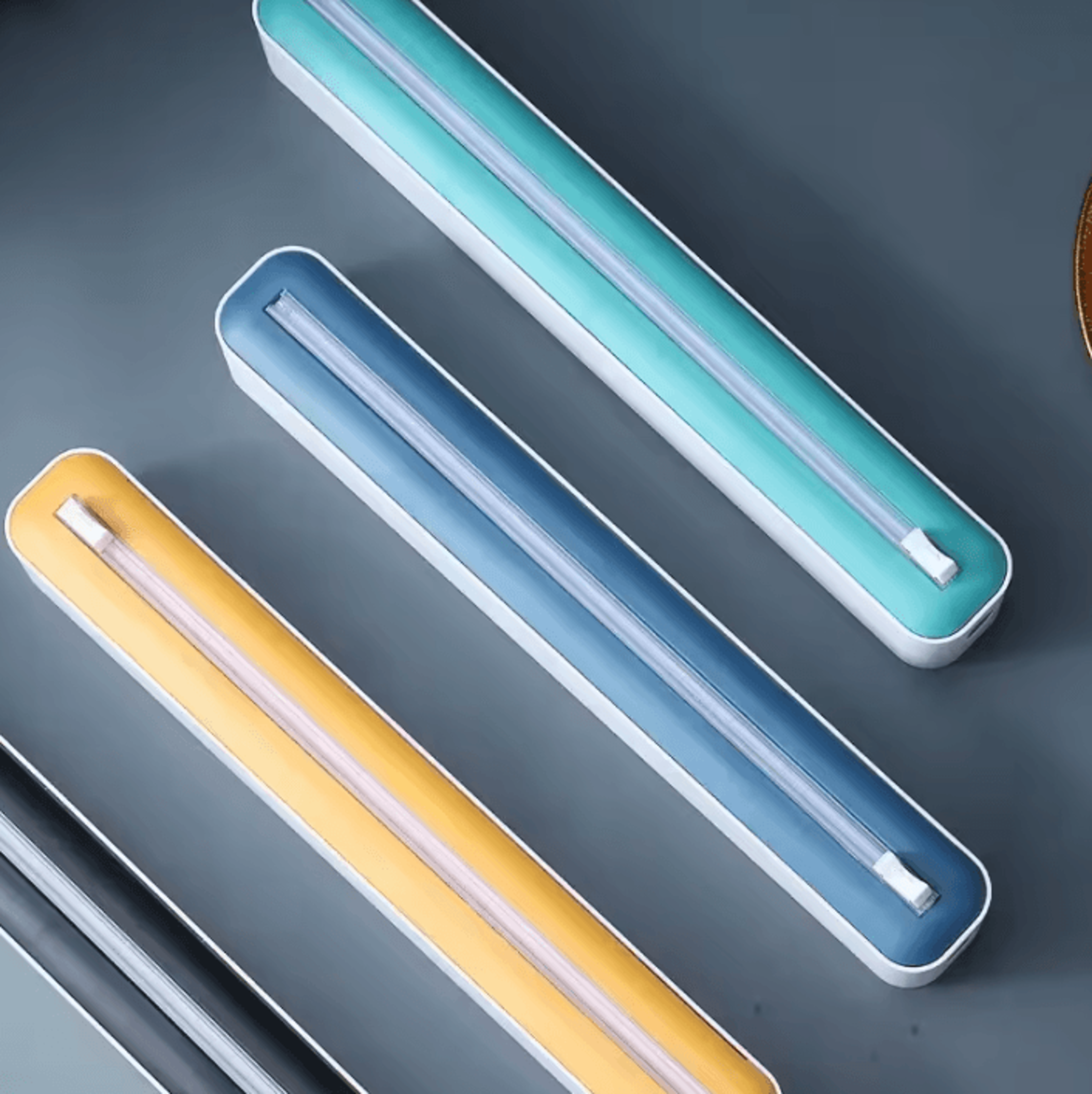 magnetic cling wrap dispenser with slide cutter & refillable storage