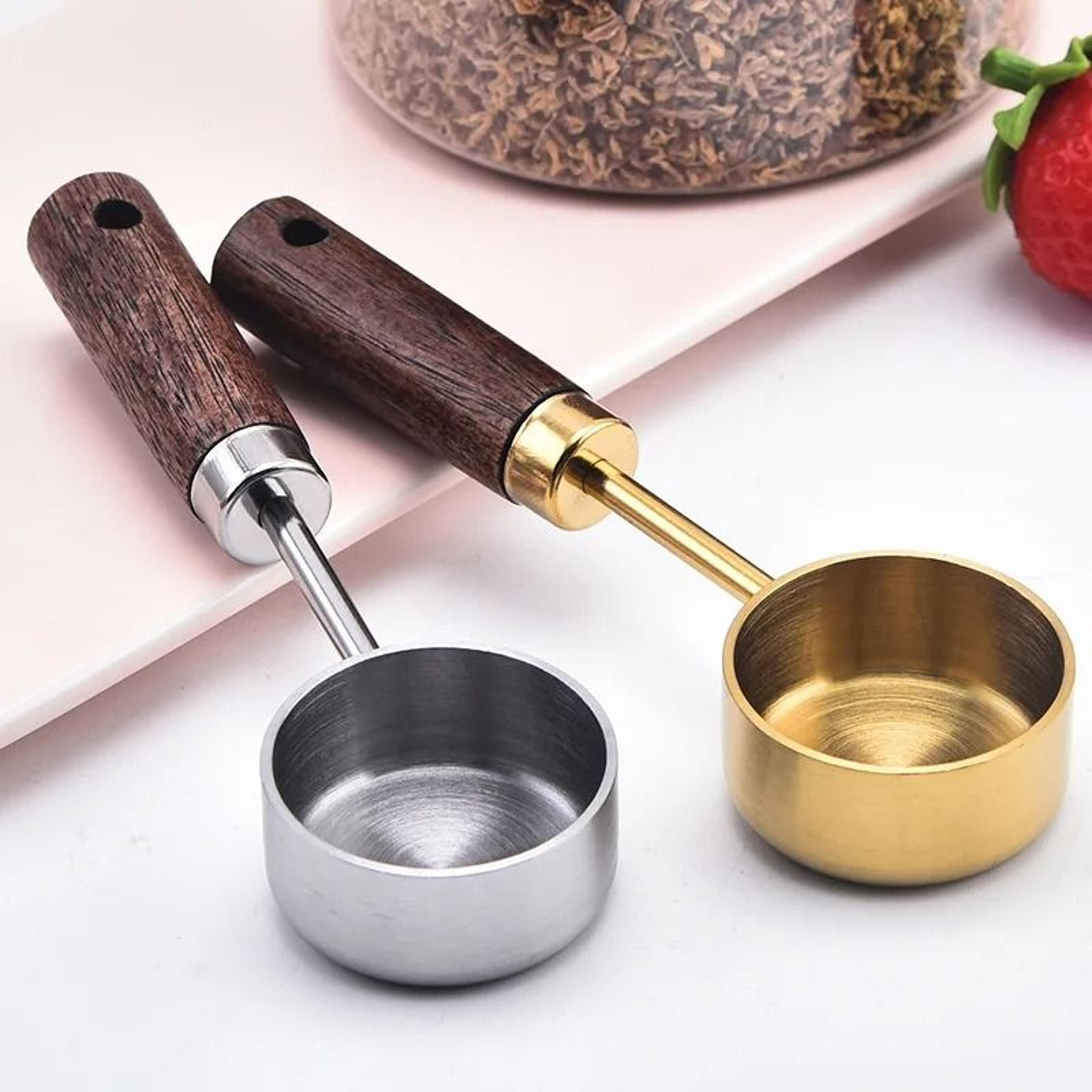 stainless steel measuring spoon with wood handle for coffee, sugar, and powder portioning