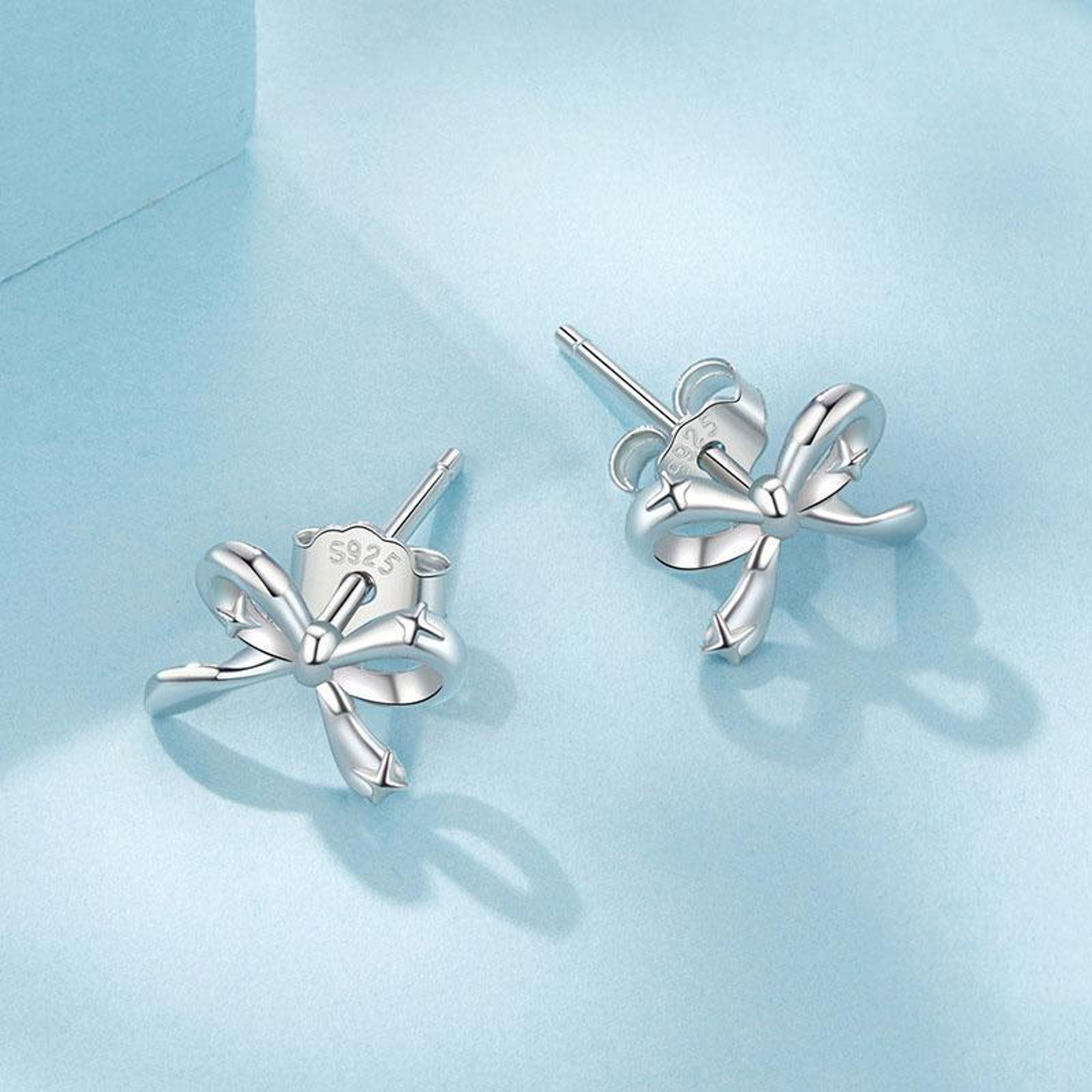 Elegant Sterling Silver Bow Earrings Platinum Plated S925 Hypoallergenic Studs For Women 1