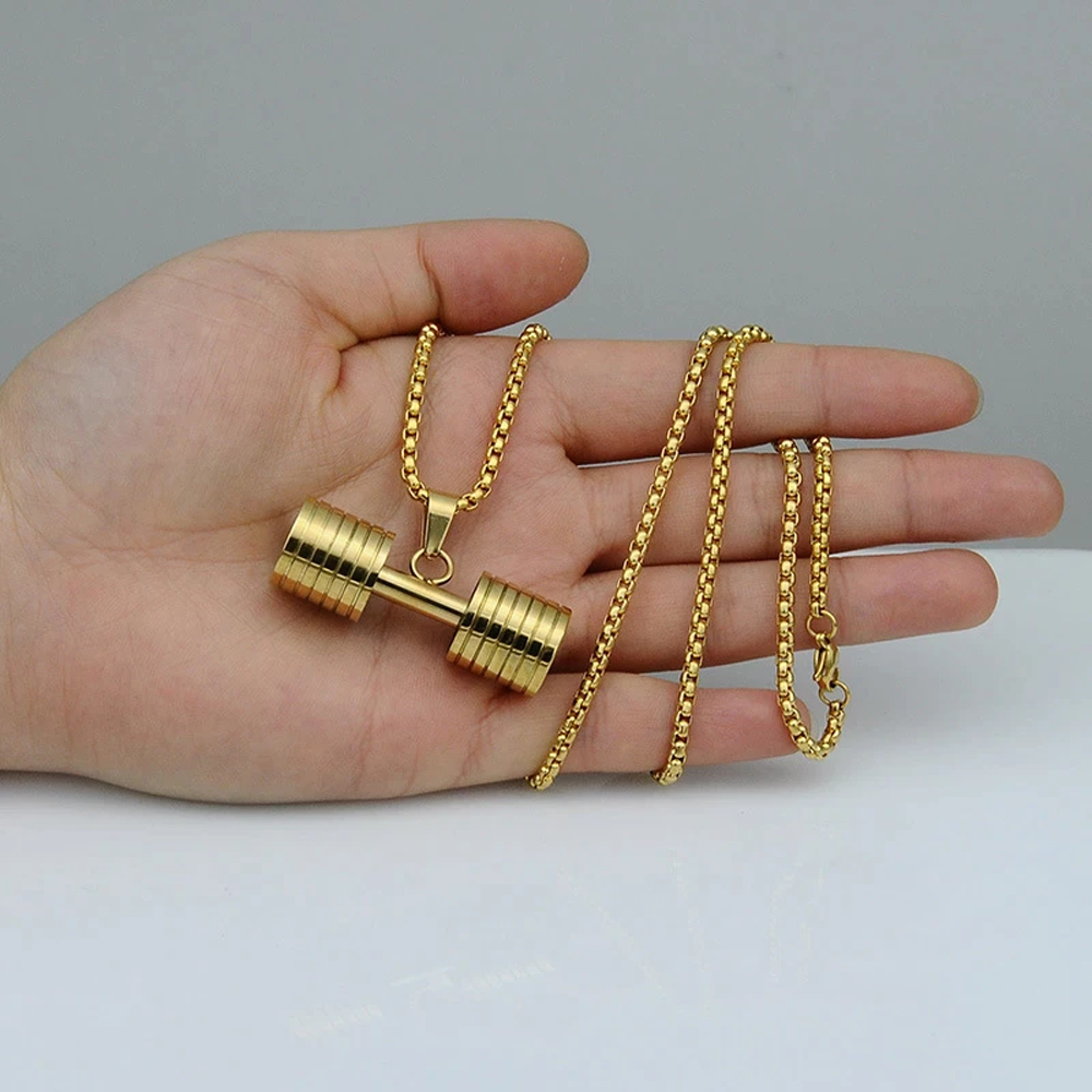 copperweightlifternecklacegold