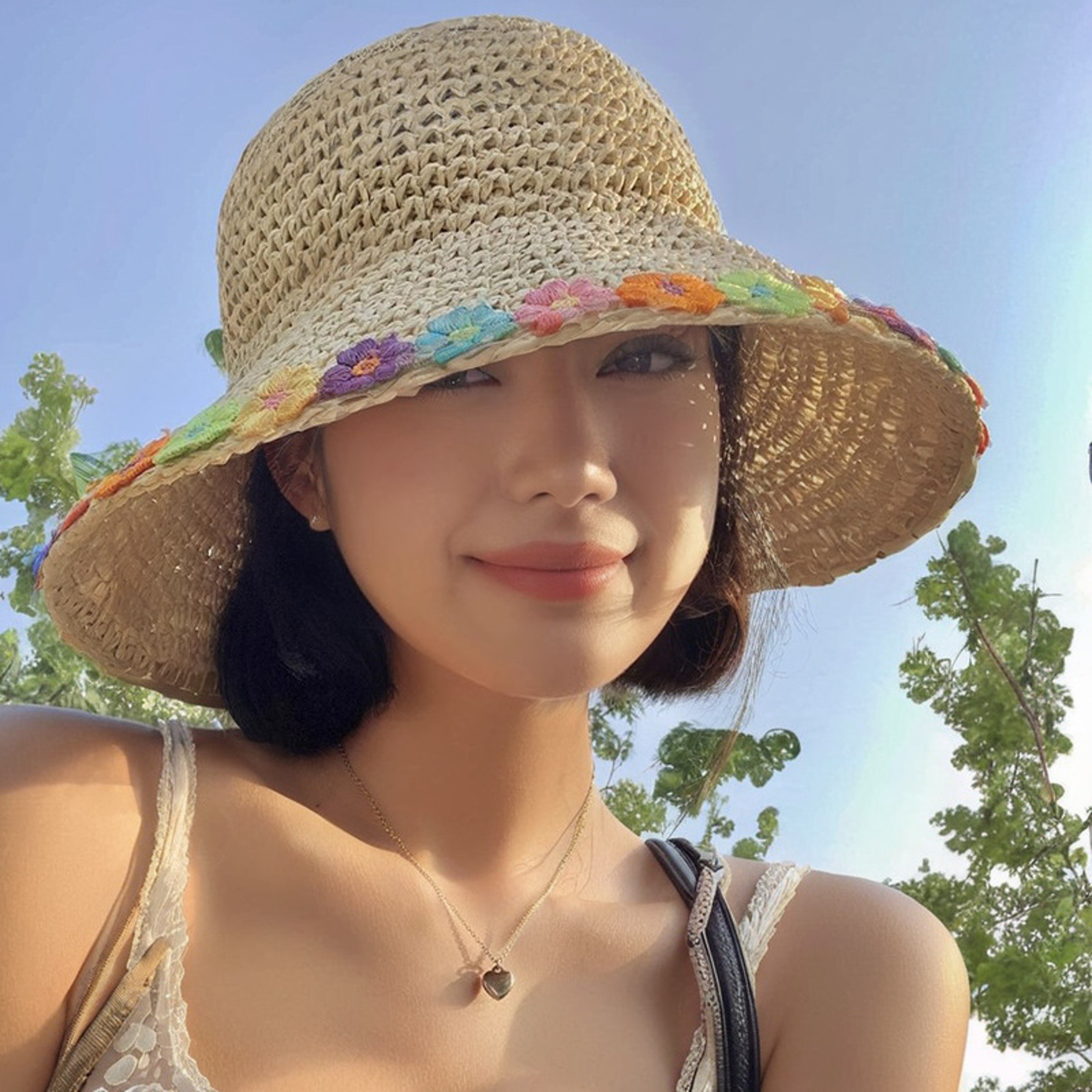 Woven Straw Sun Hat With Floral Accent 1