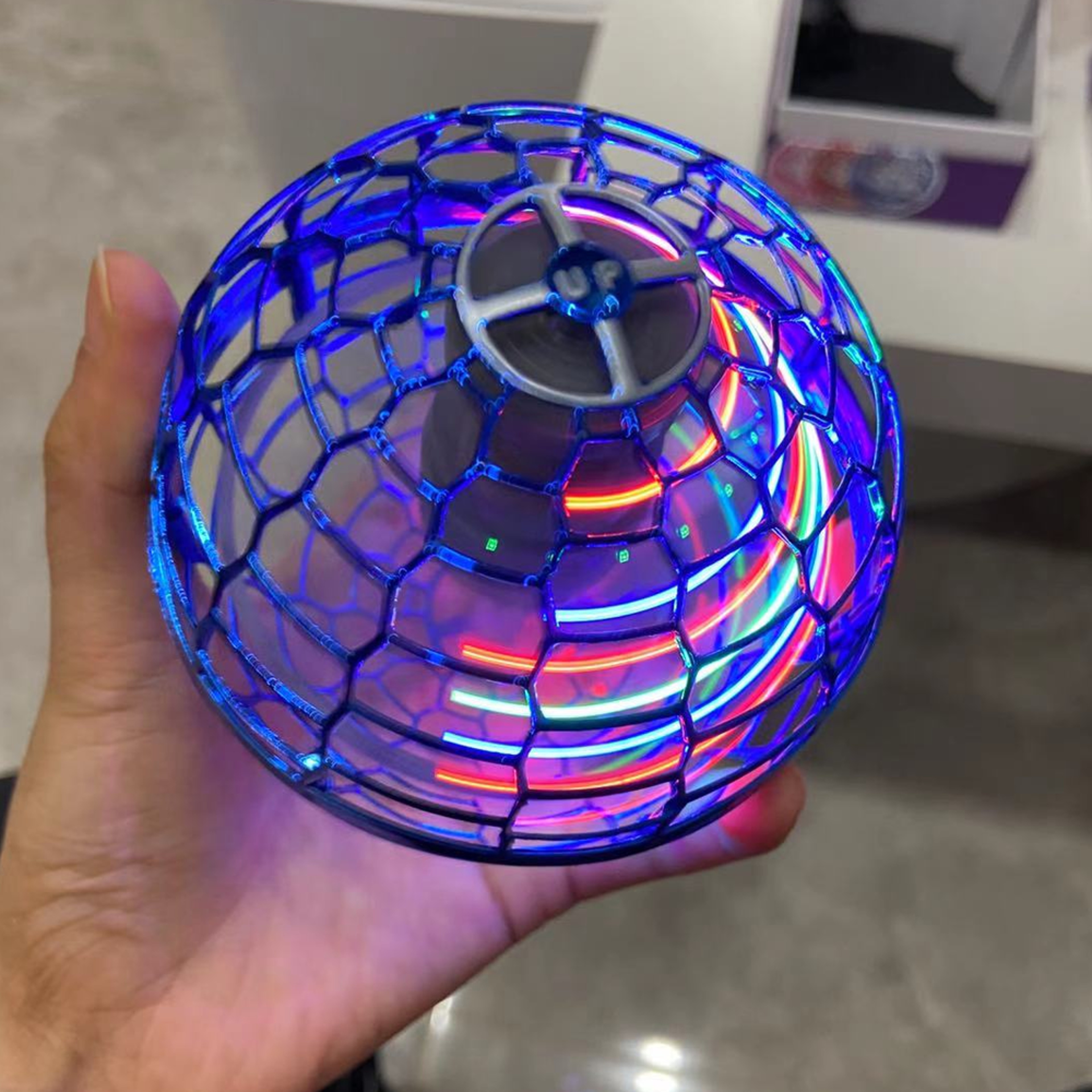 Durable flying spinner ball for active play