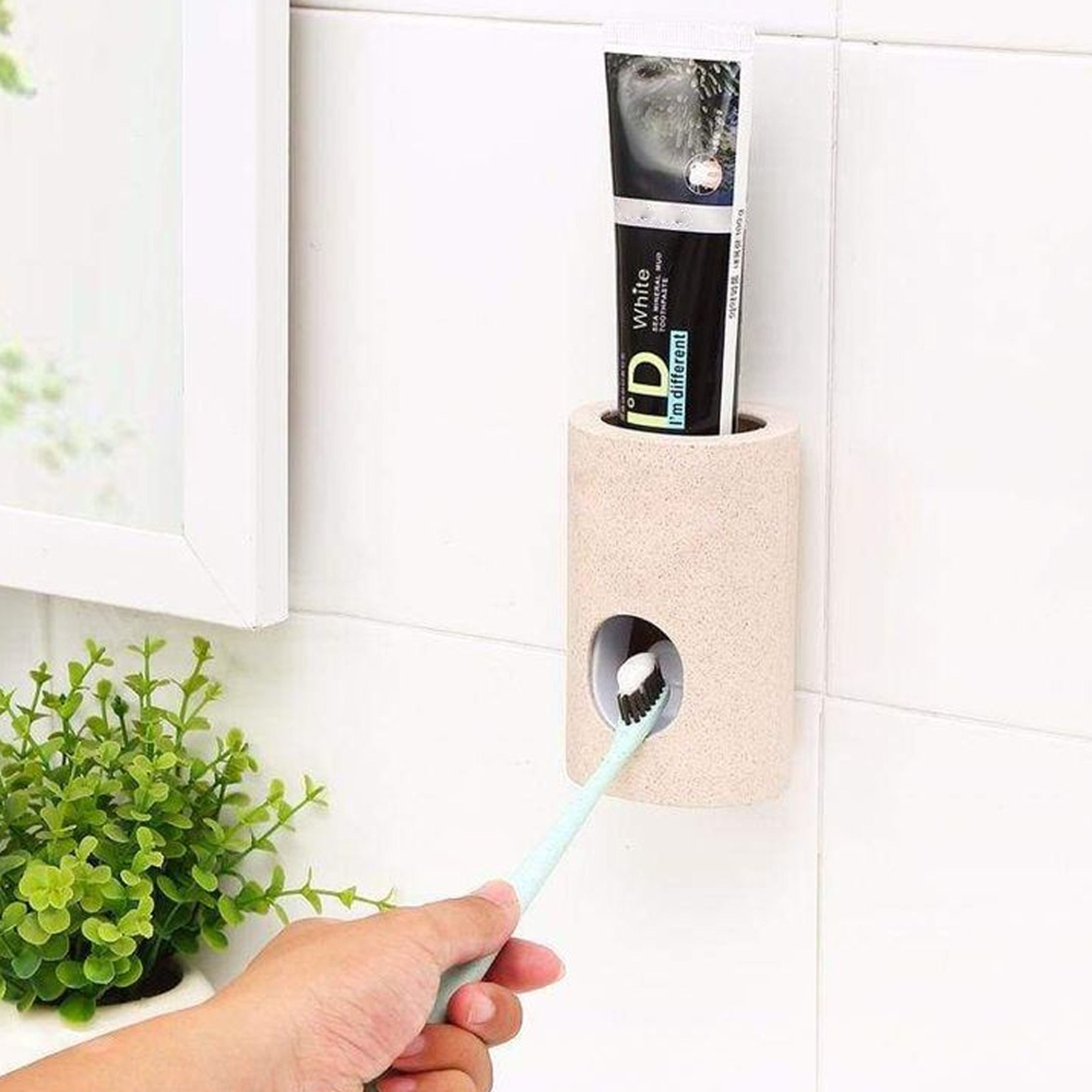 automaticsqueezertoothpastedispenser4.png