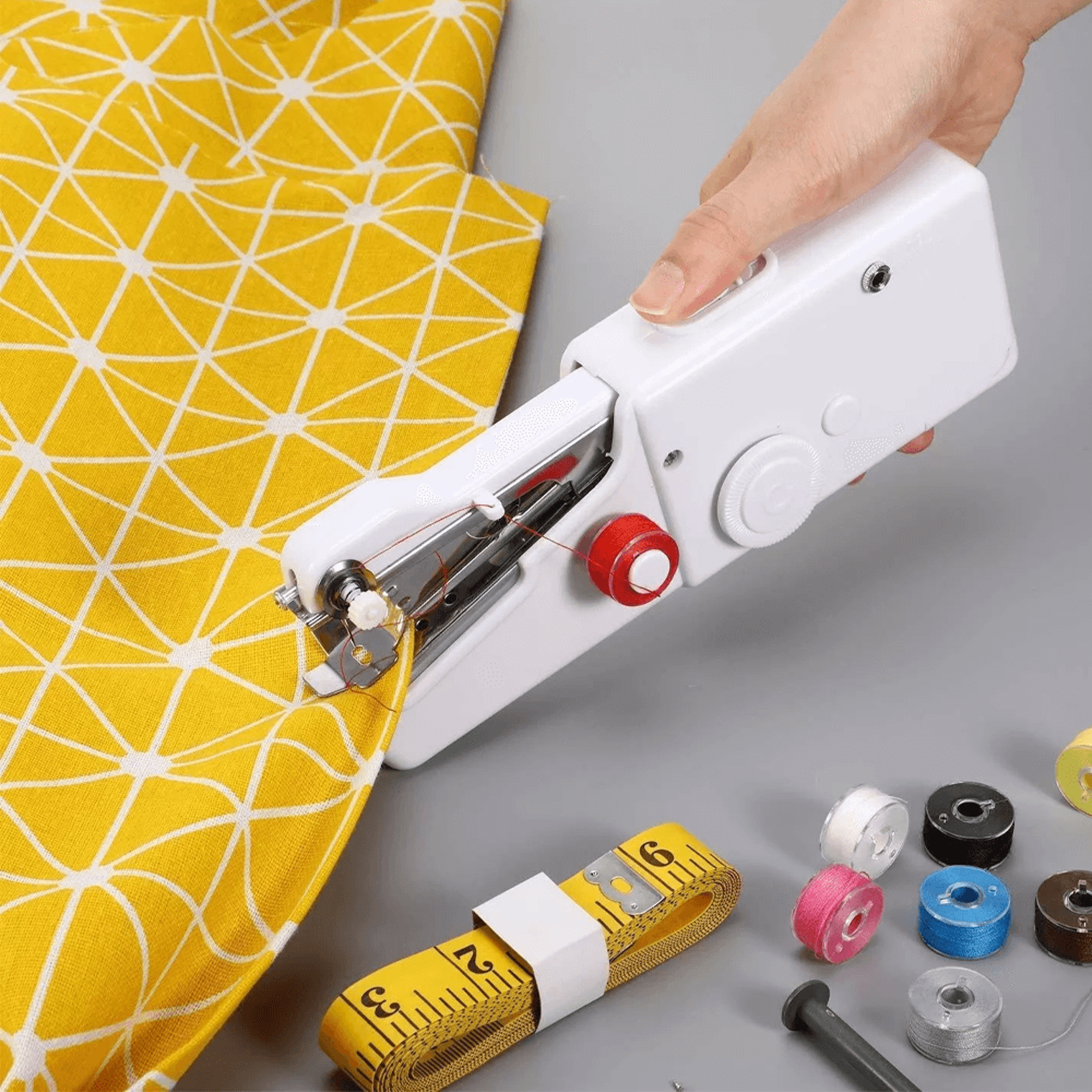 handheldminielectricsewingmachine1.png