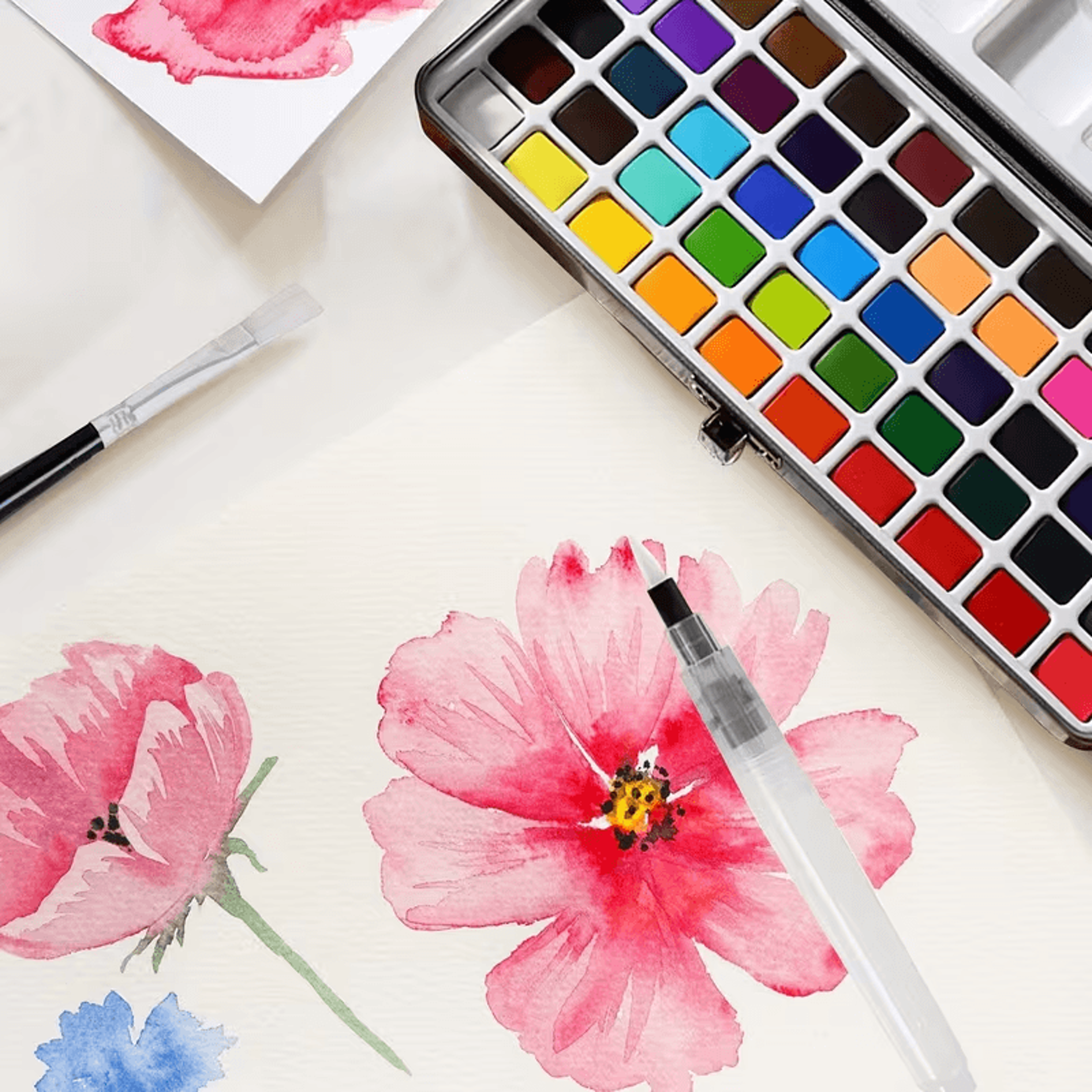travel friendly watercolor palette with brush
