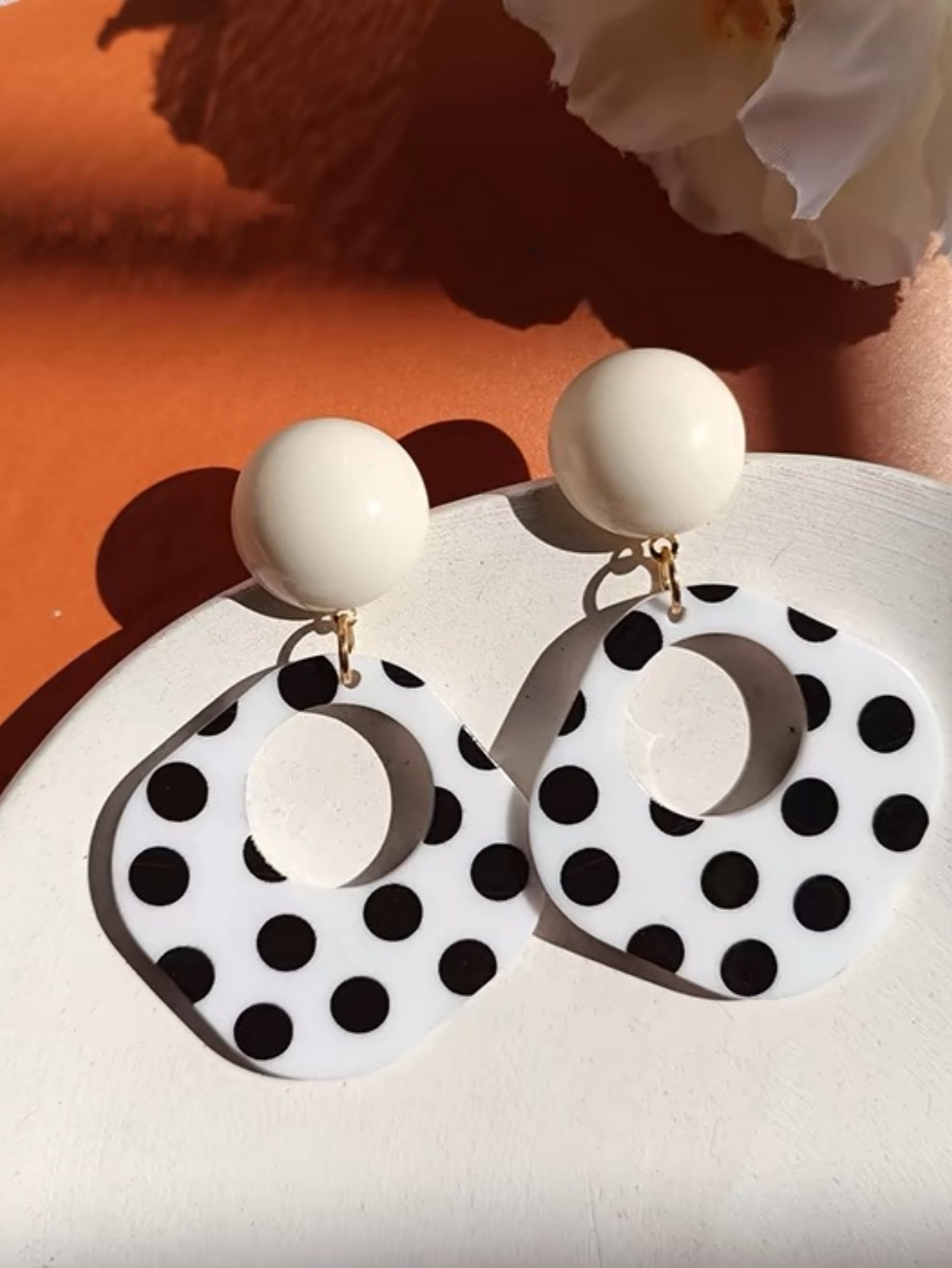 A Pair of Black and White large Polka Dot Hollow Geometric Shape Nostalgia Harbor Wind Earrings – view 1