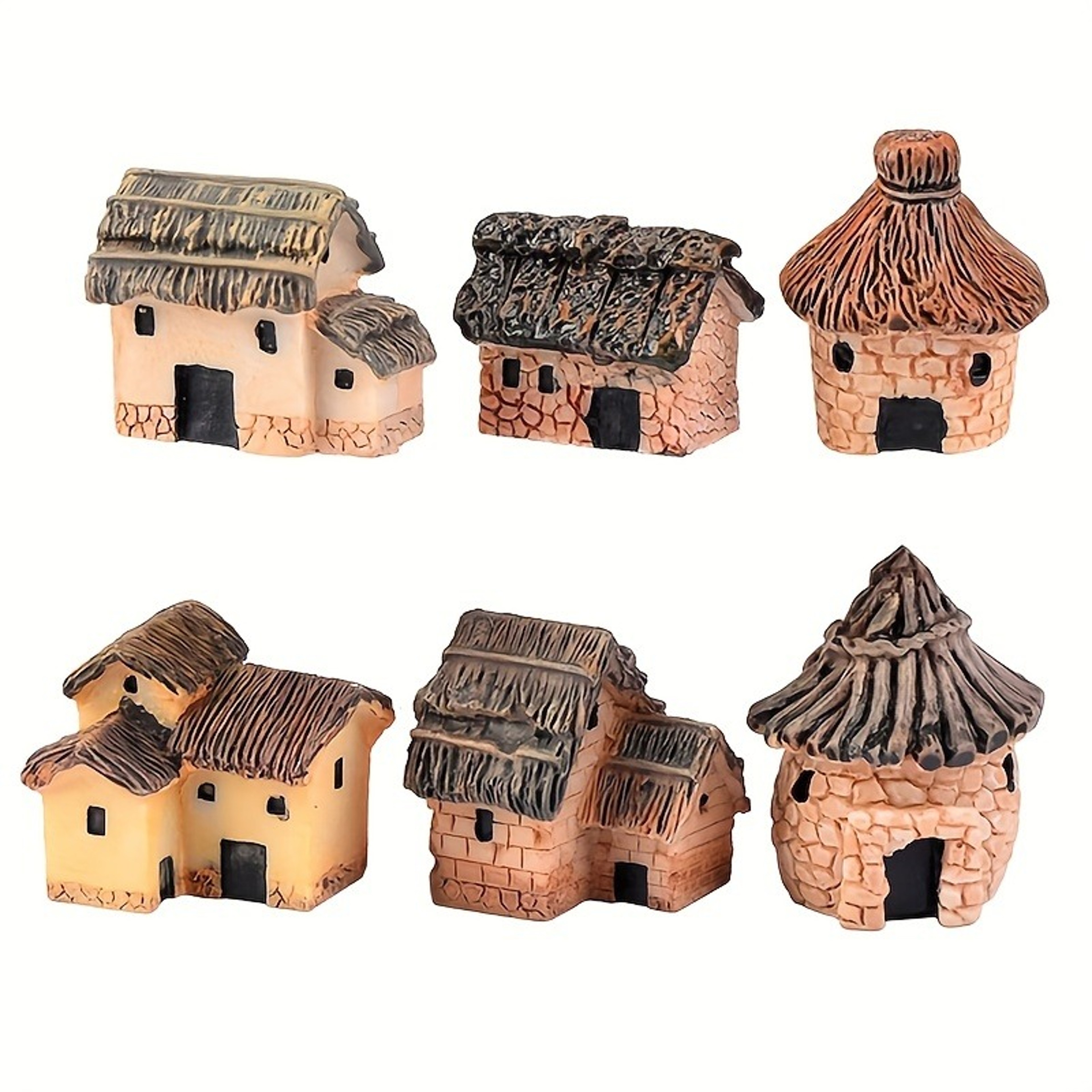 Closeup of the handcrafted details on the mini village huts showcasing their fine craftsmanship