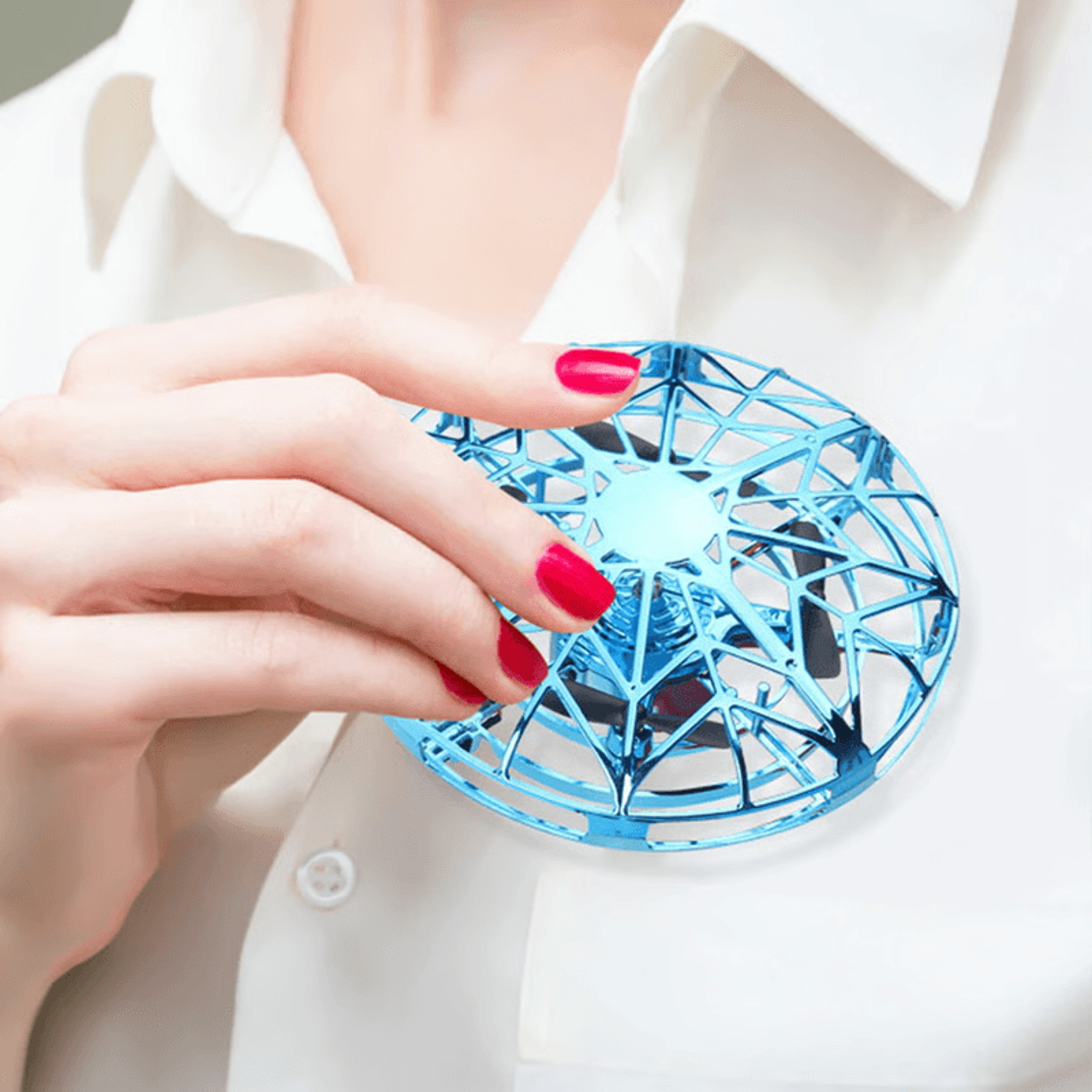 child flying gesture controlled drone indoors