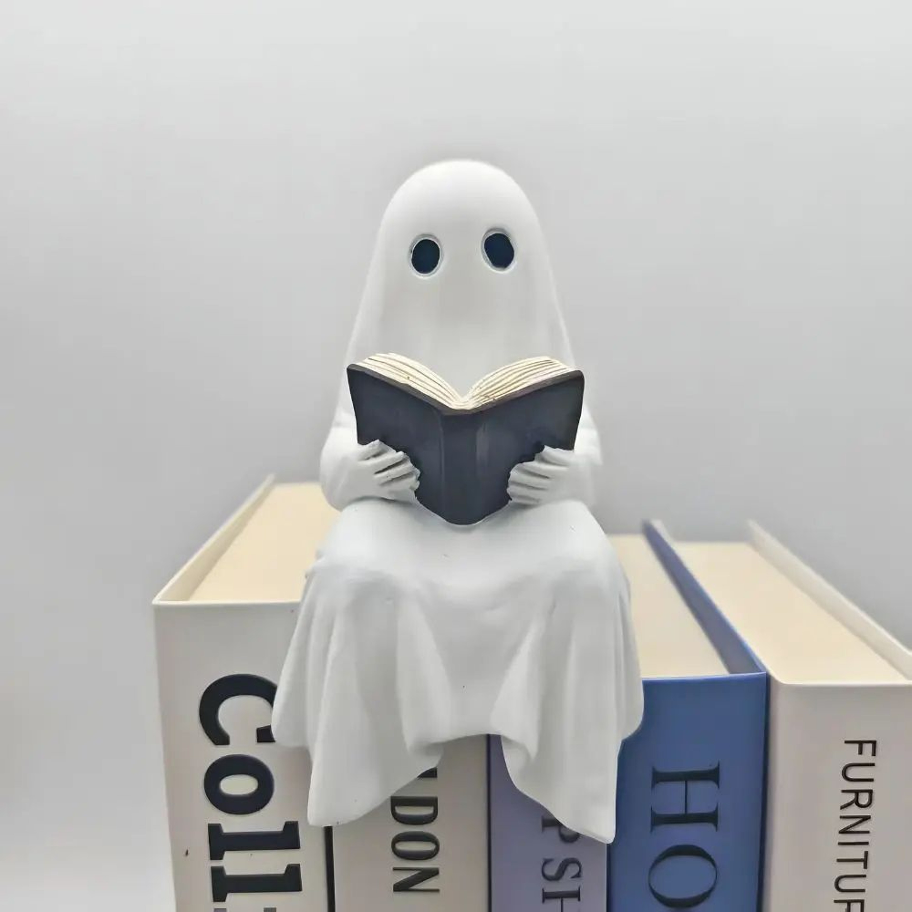Reading Ghost Resin Figurine 3