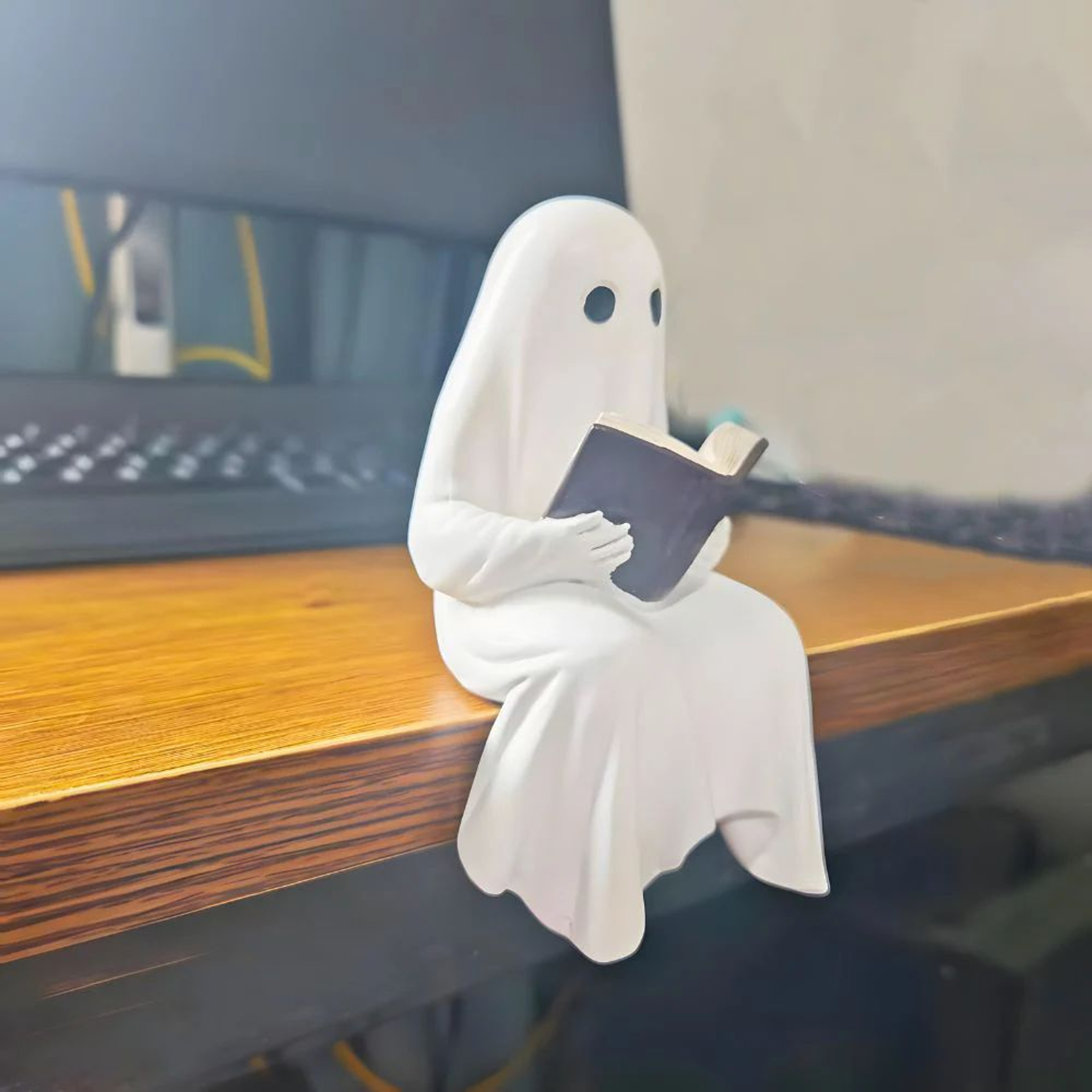 Reading Ghost Resin Figurine 4