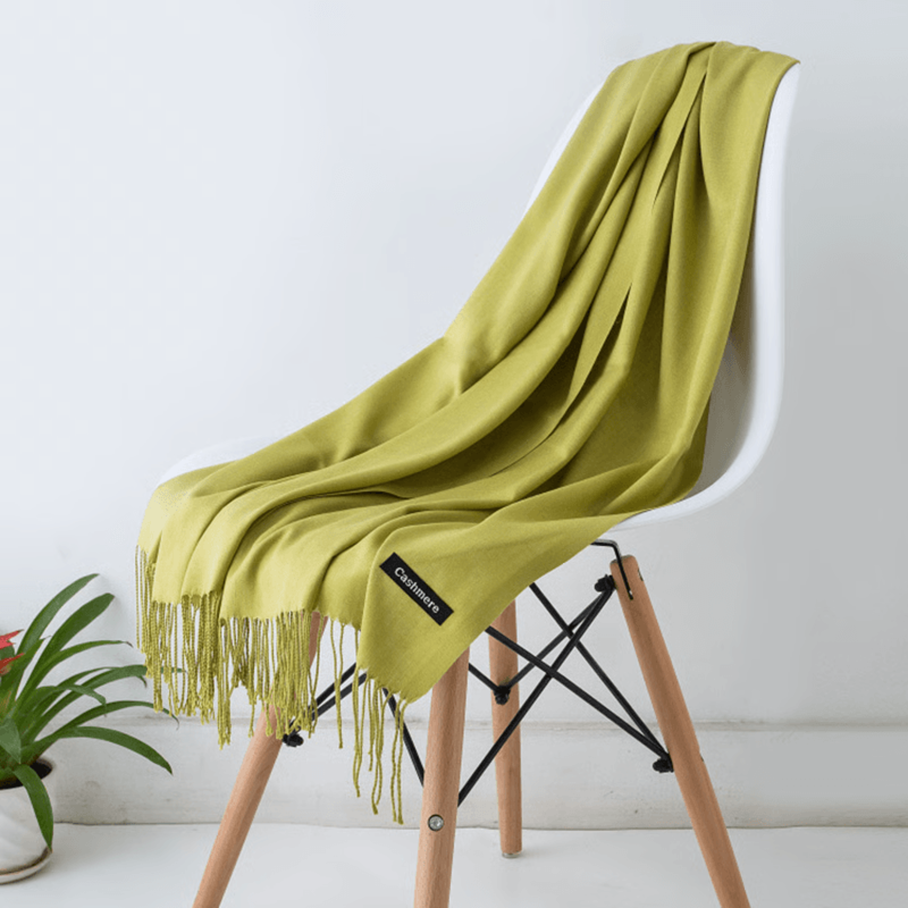 Neutral tone scarf draped on coat