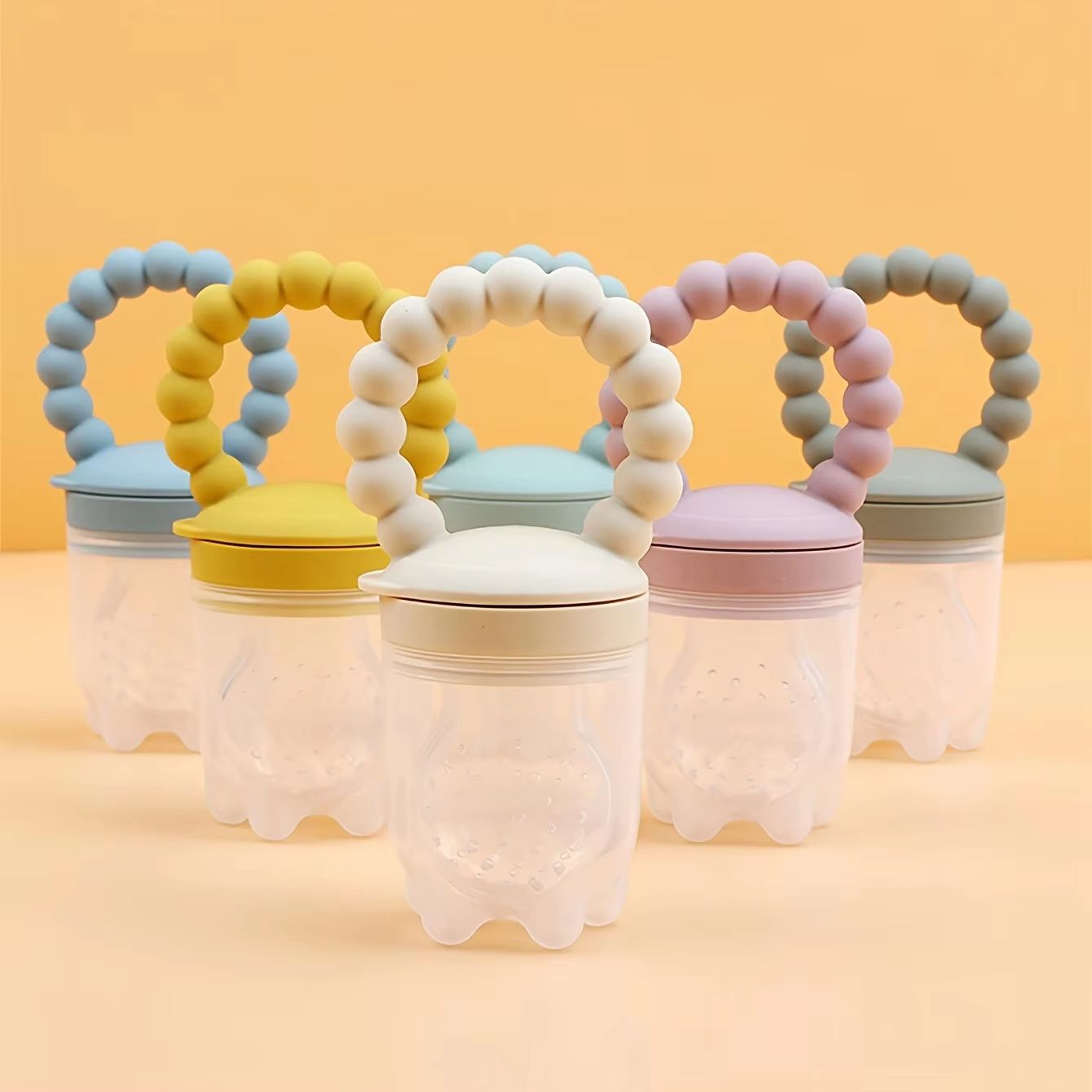 4Piece Silicone Baby Fruit Feeder With EasyGrip Handle And Extra Pouches 0