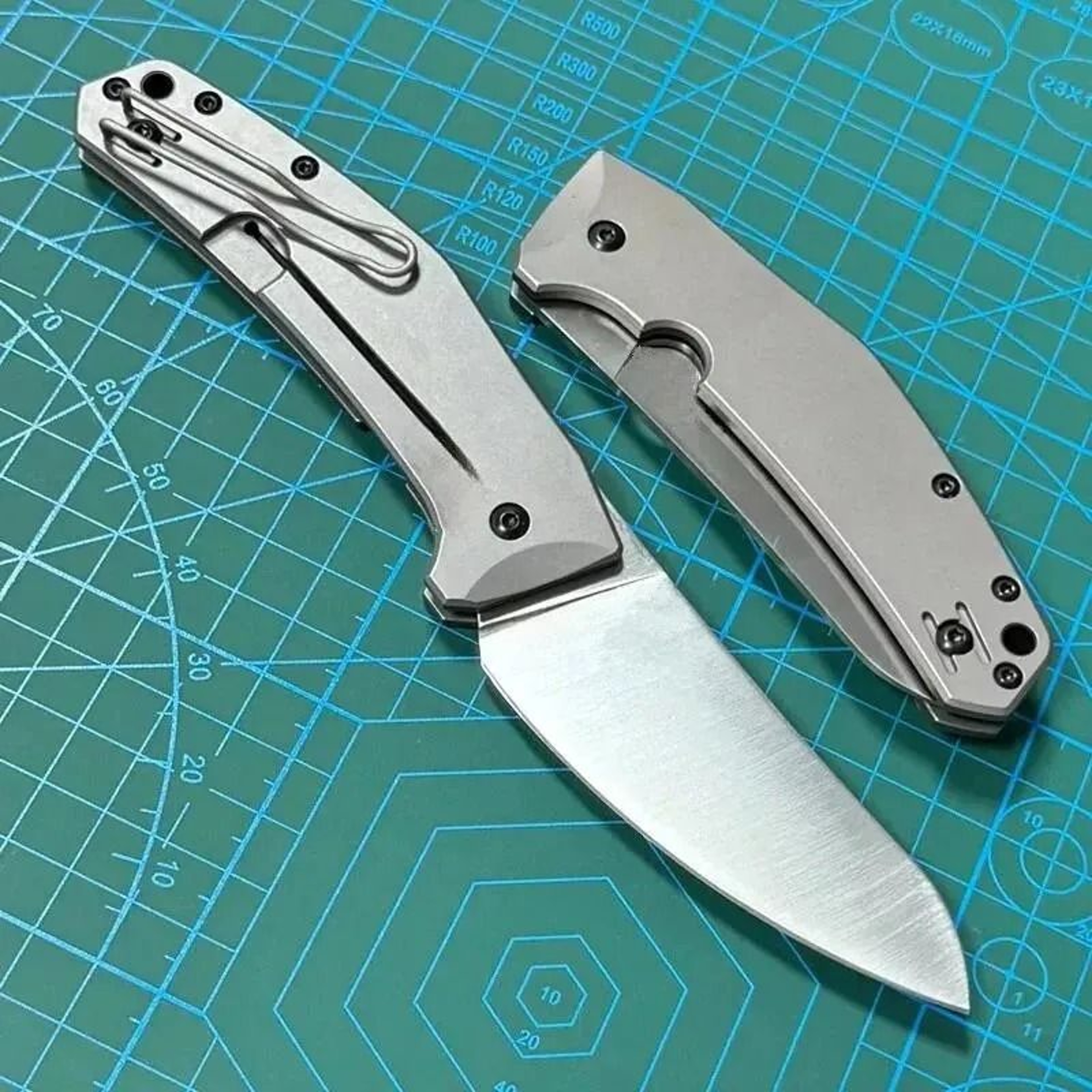 Folding Pocket Knife With Titanium Handle For Lightweight Everyday Carry 0