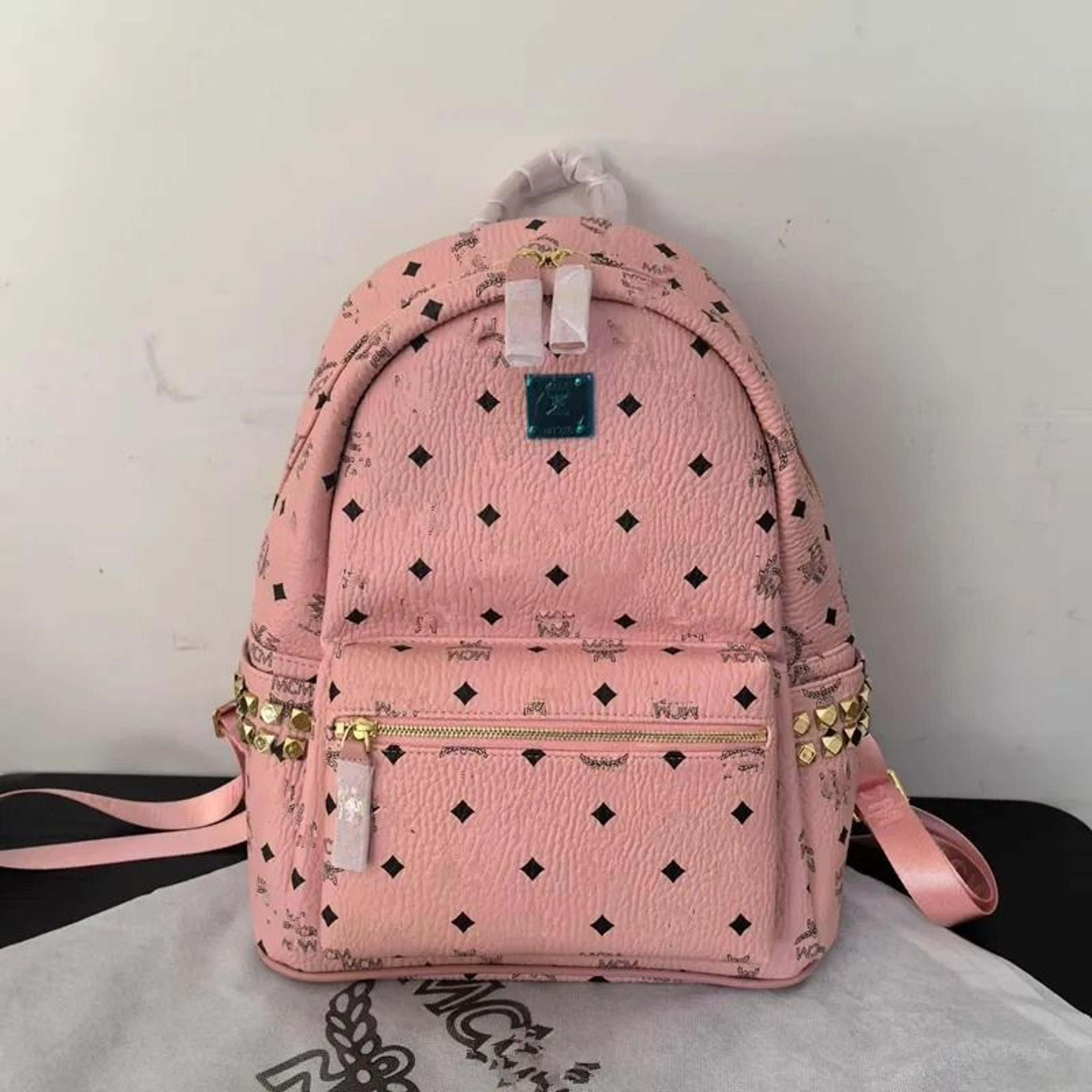 Studded Cognac Brown Backpack With Monogram And Pyramid Rivet Detail 0