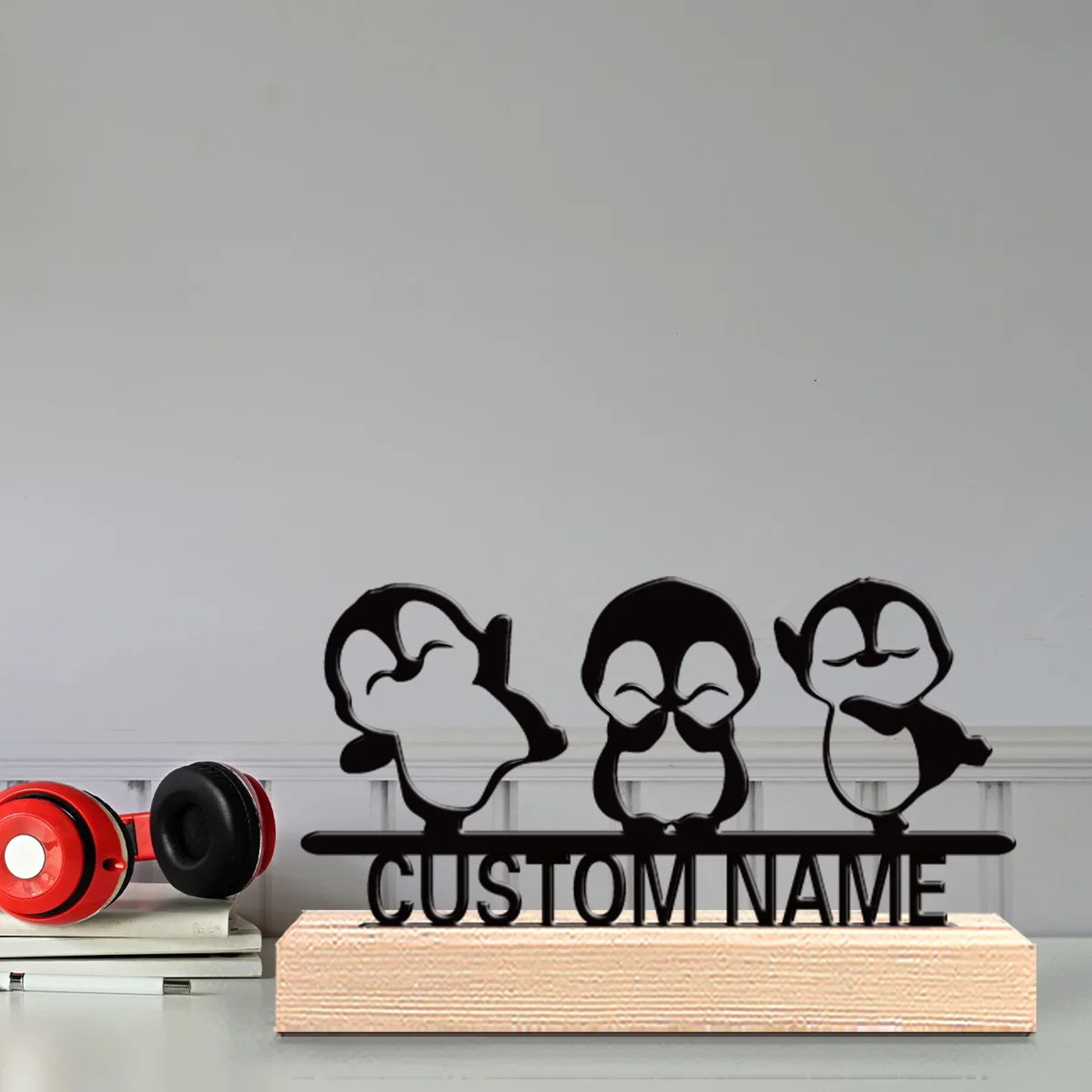 Cute Penguin Metal Statue Trio With Wooden Base 1