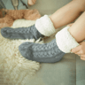 sherpa lined slipper socks on hardwood floor