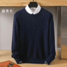 mens knit sweater styled with jeans in cold weather