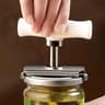 Stainless Steel Adjustable Bottle Opener LaborSaving Rotating Kitchen Lid Opener 0