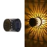 Solar Outdoor Wall Light Projects Elegant Patterns Across Gardens And Patios 1